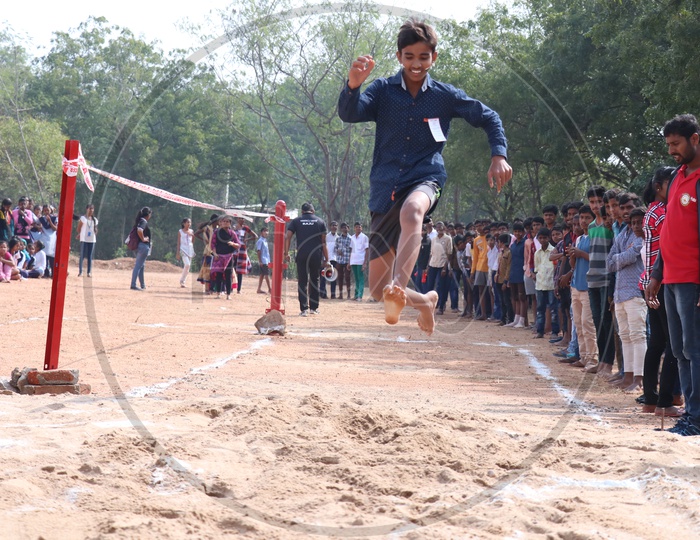 Image of Indian School Students Or Children Participating In Long Jump ...