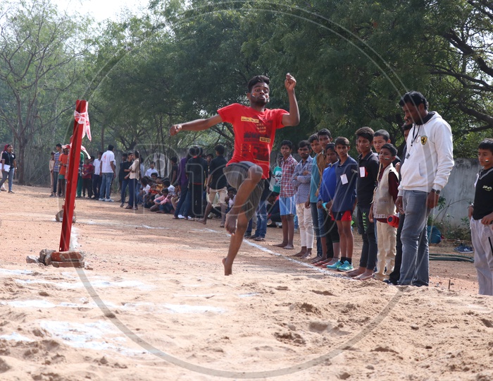Image of Indian School Students Or Children Participating In Long Jump ...