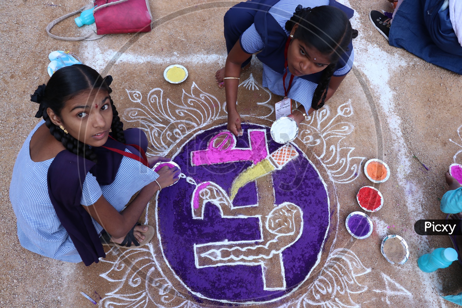 Indian School Girls Participating In Rangoli Competition