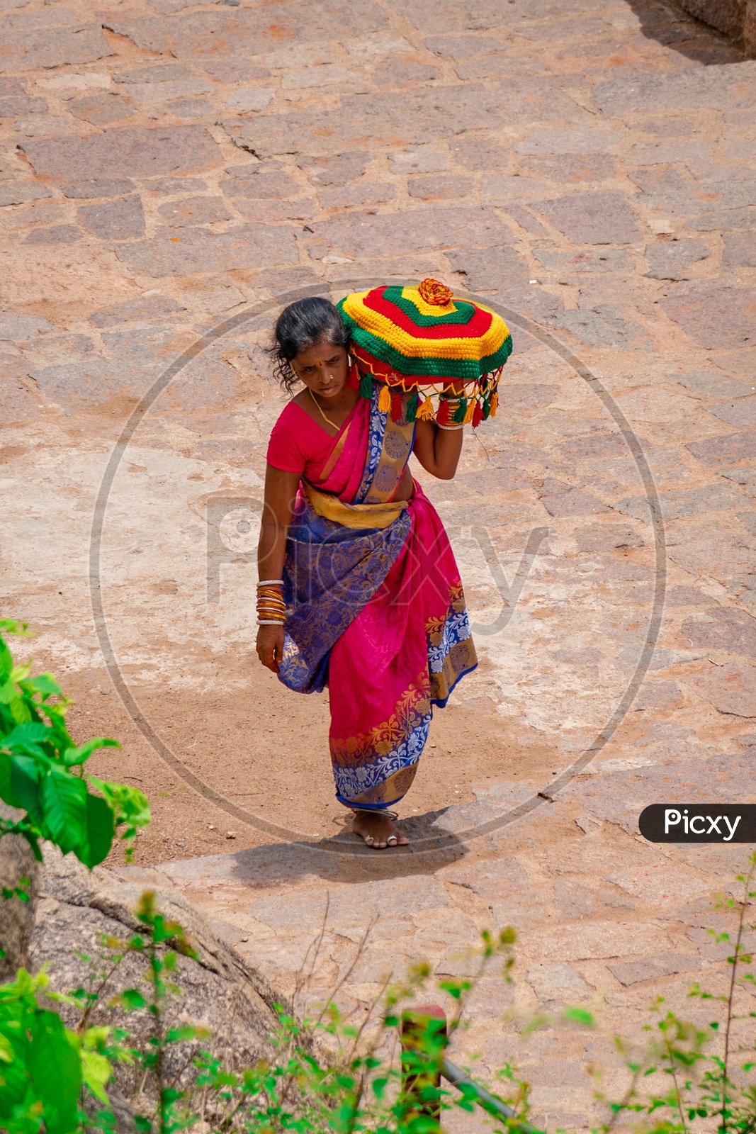 Woman carrying Bonam on the eve of  Golconda bonalu celebrations.