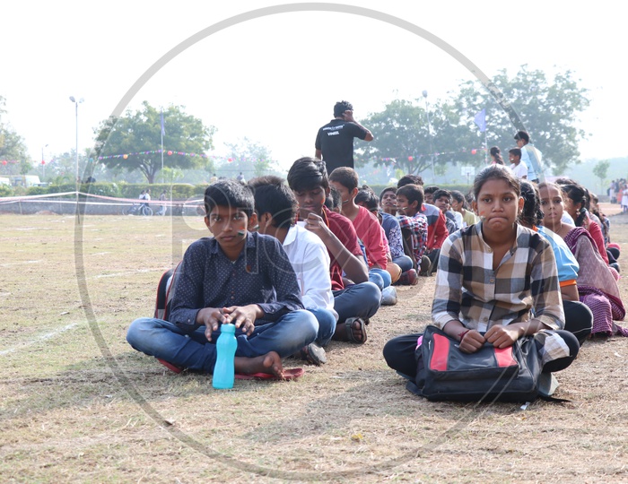 School Students Or Children Sitting In  Queue Lines