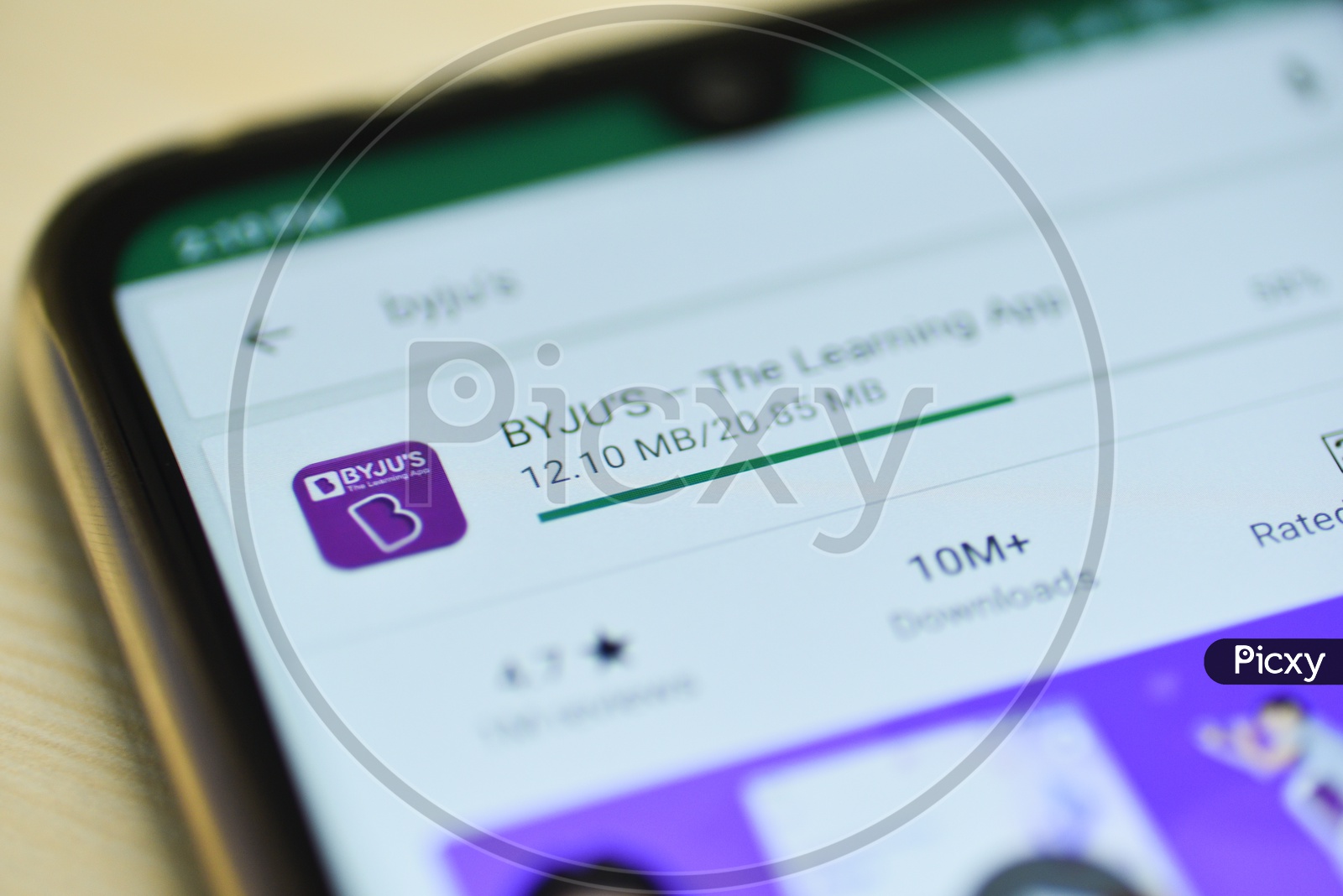 BYJU's Or BYJUS The Learning App or Application Being Installing  in  Mobile  or Smartphone  Closeup