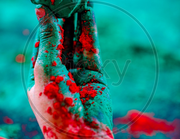Holi Colour  Ball Or Holi Colour Bomb  Holding In Hand Closeup