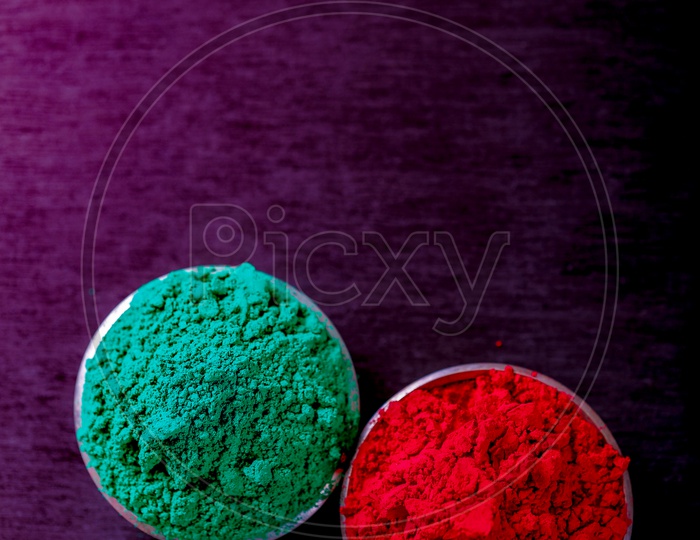 Holi Colours in Bowls On an isolated Black Background