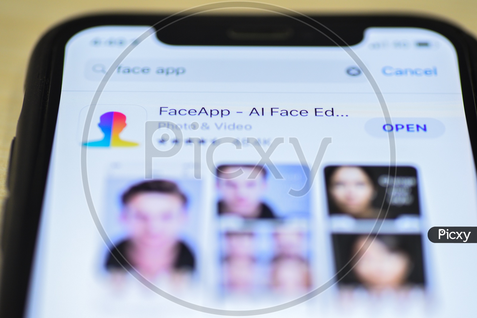 FaceApp  AI  Face  Editor  Application Being Installed  in Smartphone