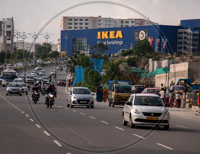Traffic on four lane road at IKEA showroom, Gachibowli, Hyderabad.