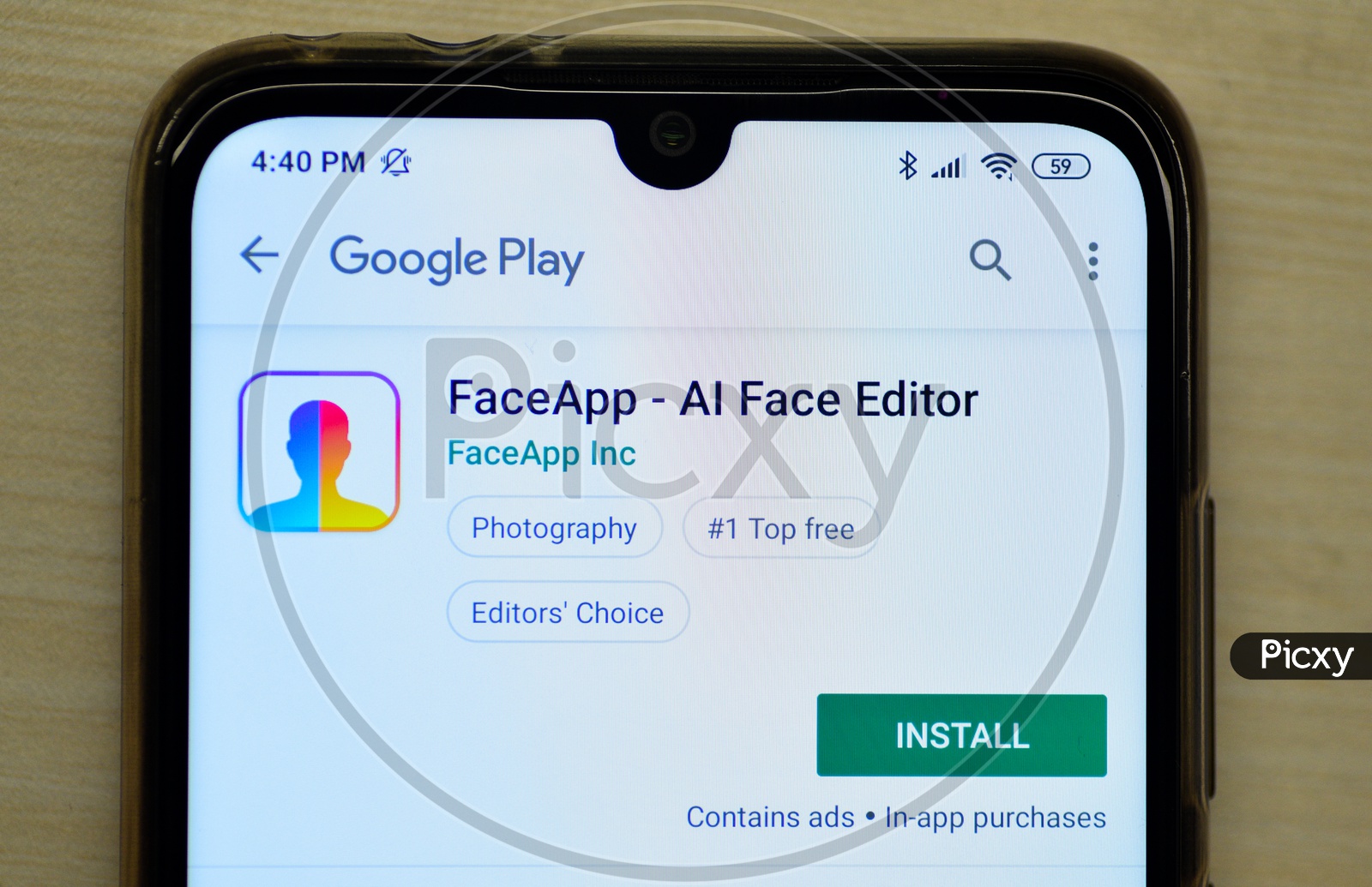 FaceApp  AI  Face  Editor  Application Being Installed  in Smartphone