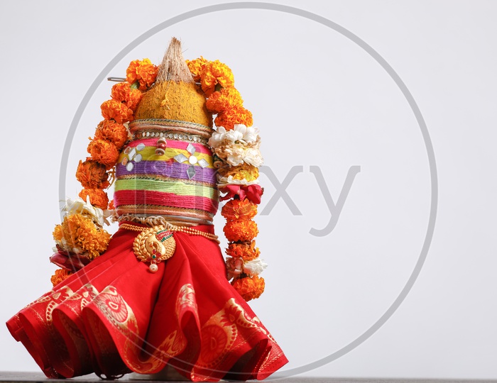 Kalash For Marathi New Year Gudi Padwa With Handi Coconut  Scared Clothes And Neem leaflet on an Isolated  Background