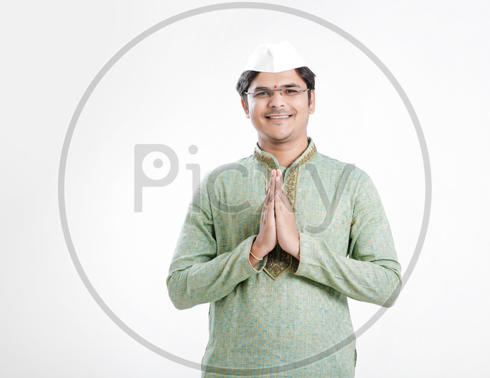 Image of Indian Man Wearing Traditional Dress and With Smile Face And  Marathi Cap On an Isolated White Background-BI941648-Picxy