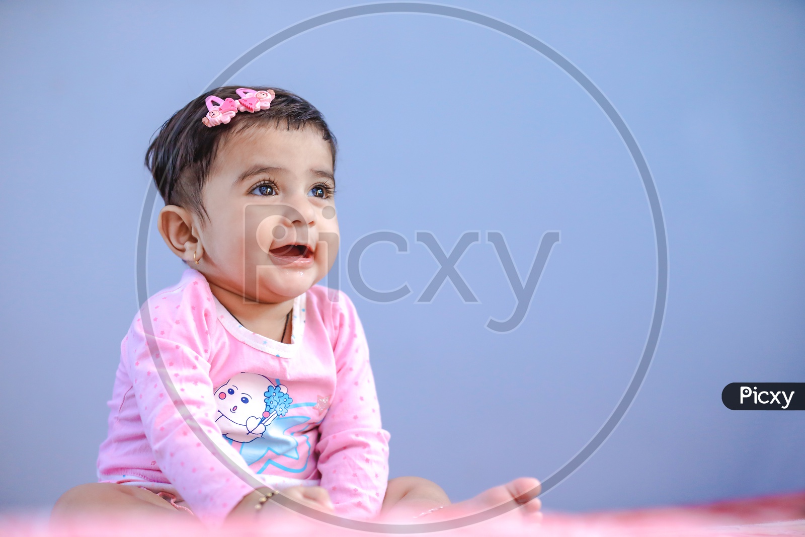 Cute Indian Baby Girl With Smiling Face On an Isolated  Background