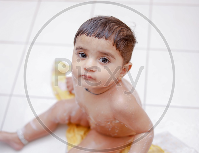 Cute Indian Baby Girl Taking Shower