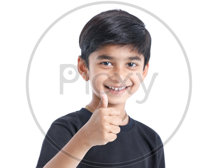 Indian Cute Little Boy Or Asian Kid  Showing Gestures With Expressions On Face On an Isolated White Background