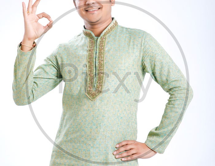 Indian Man Wearing Traditional Dress  With Happy  Gesture and Maharashtra  Cap or Marathi Cap on an Isolated White Background