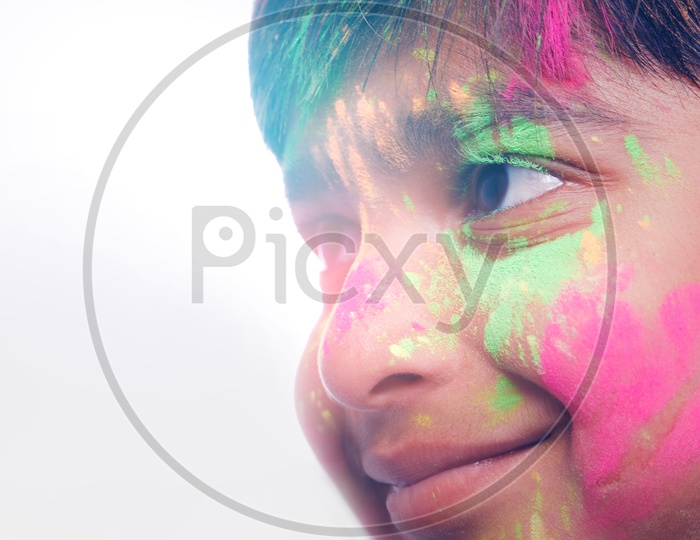 Indian or Asian Boy Playing With Holi Colours and Giving Multiple Expressions