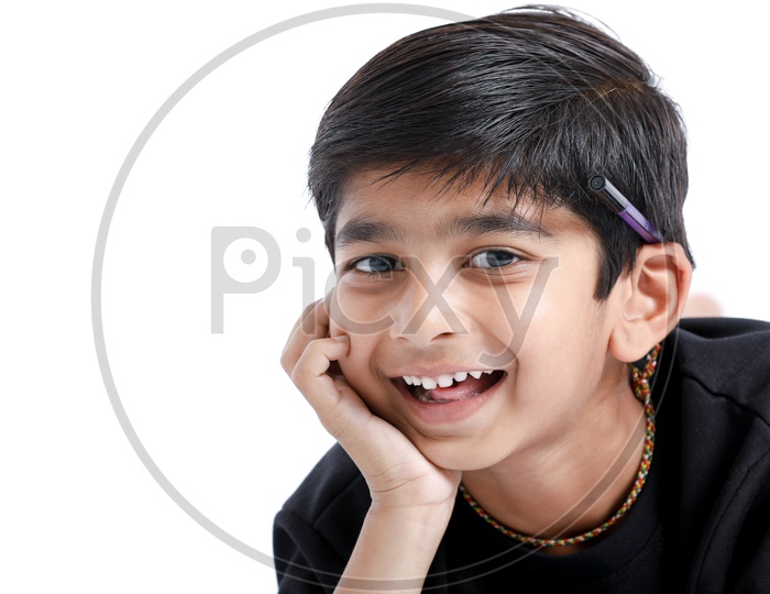 Indian Cute Little Boy Or Asian Kid   With Expressions and Smile On Face On an Isolated White Background