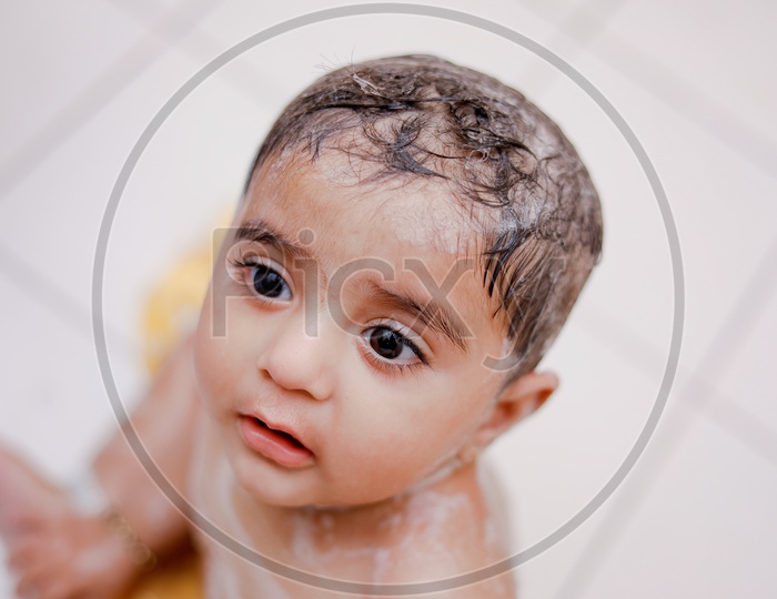 Cute Indian Baby Girl Taking Shower