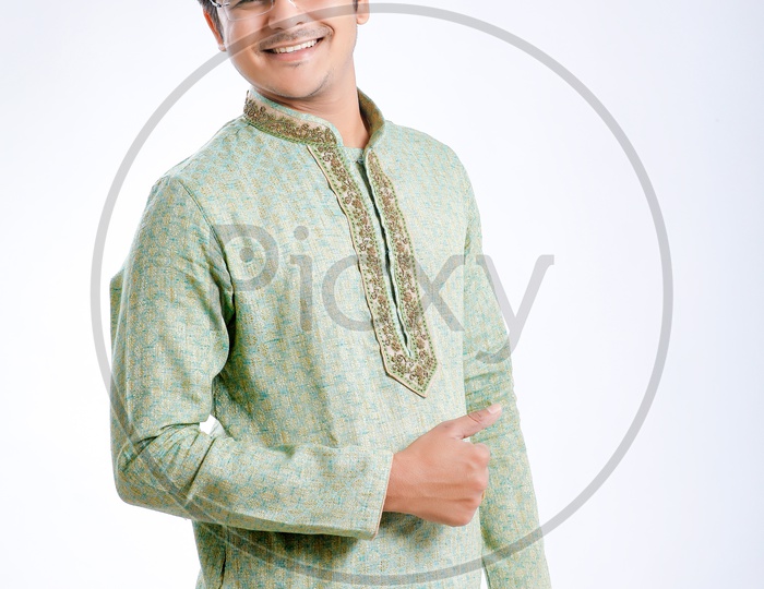 Indian Man Wearing Traditional Dress  With Happy  Gesture and Maharashtra  Cap or Marathi Cap on an Isolated White Background