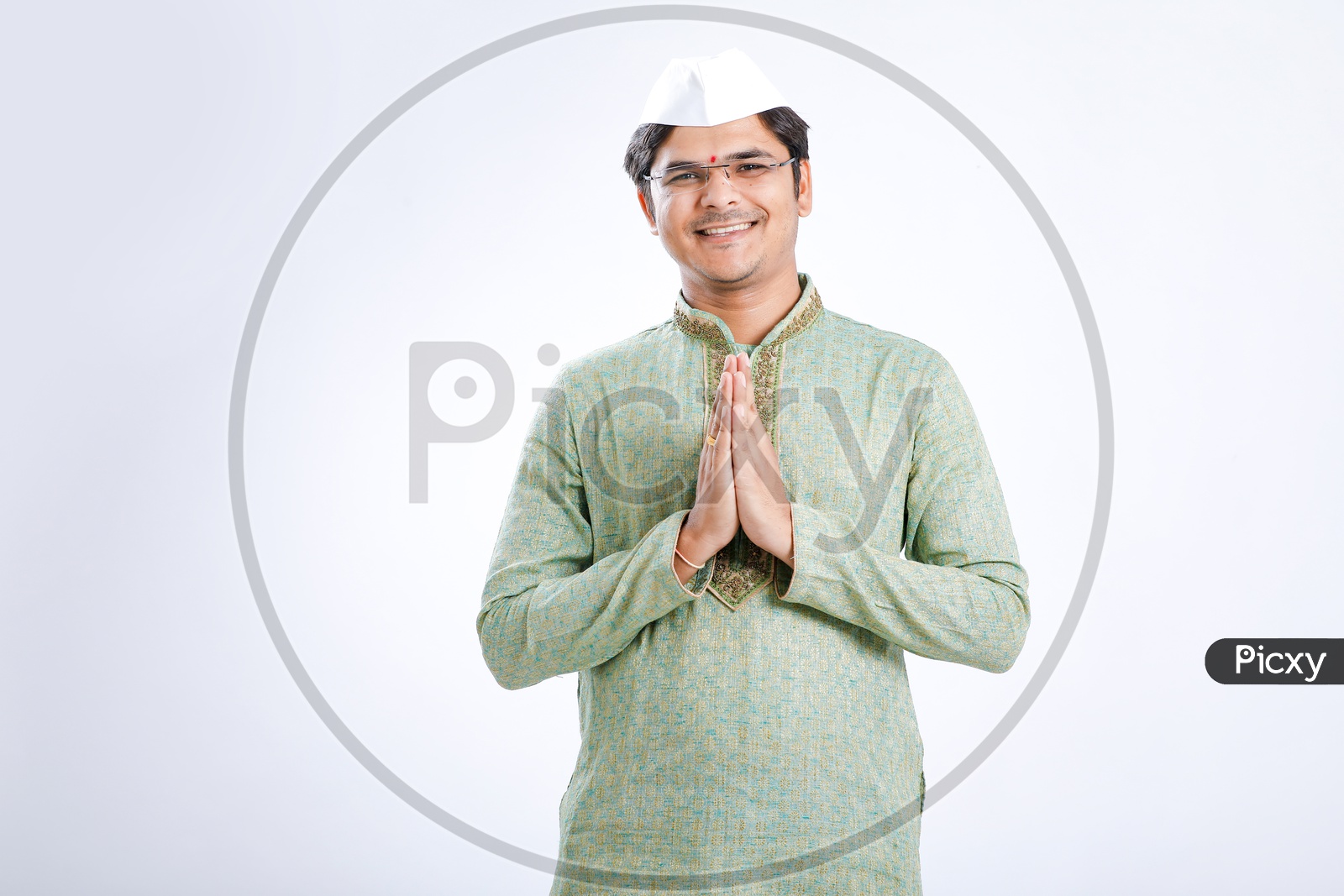 Indian Man Wearing Traditional Dress  With Namaste Gesture and Maharashtra  Cap or Marathi Cap on an Isolated White Background