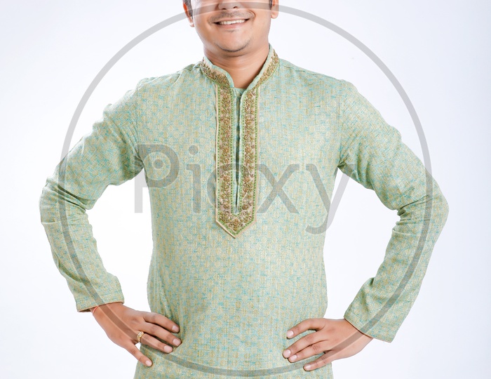 Indian Man Wearing Traditional Dress  With Happy  Gesture and Maharashtra  Cap or Marathi Cap on an Isolated White Background