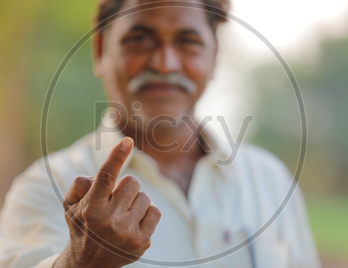 Indian Voter Showing Inked Finger
