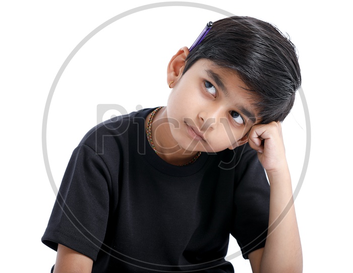 Indian or Asian boy Or Kid  with Expression and Sad  Face On an Isolated White Background
