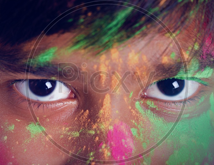 Indian or Asian Boy Playing With Holi Colours and Giving Multiple Expressions