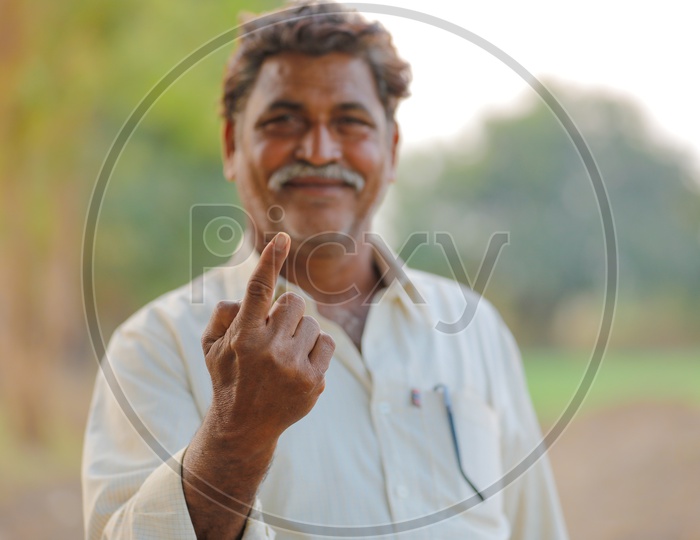 Indian Voter Showing Inked Finger