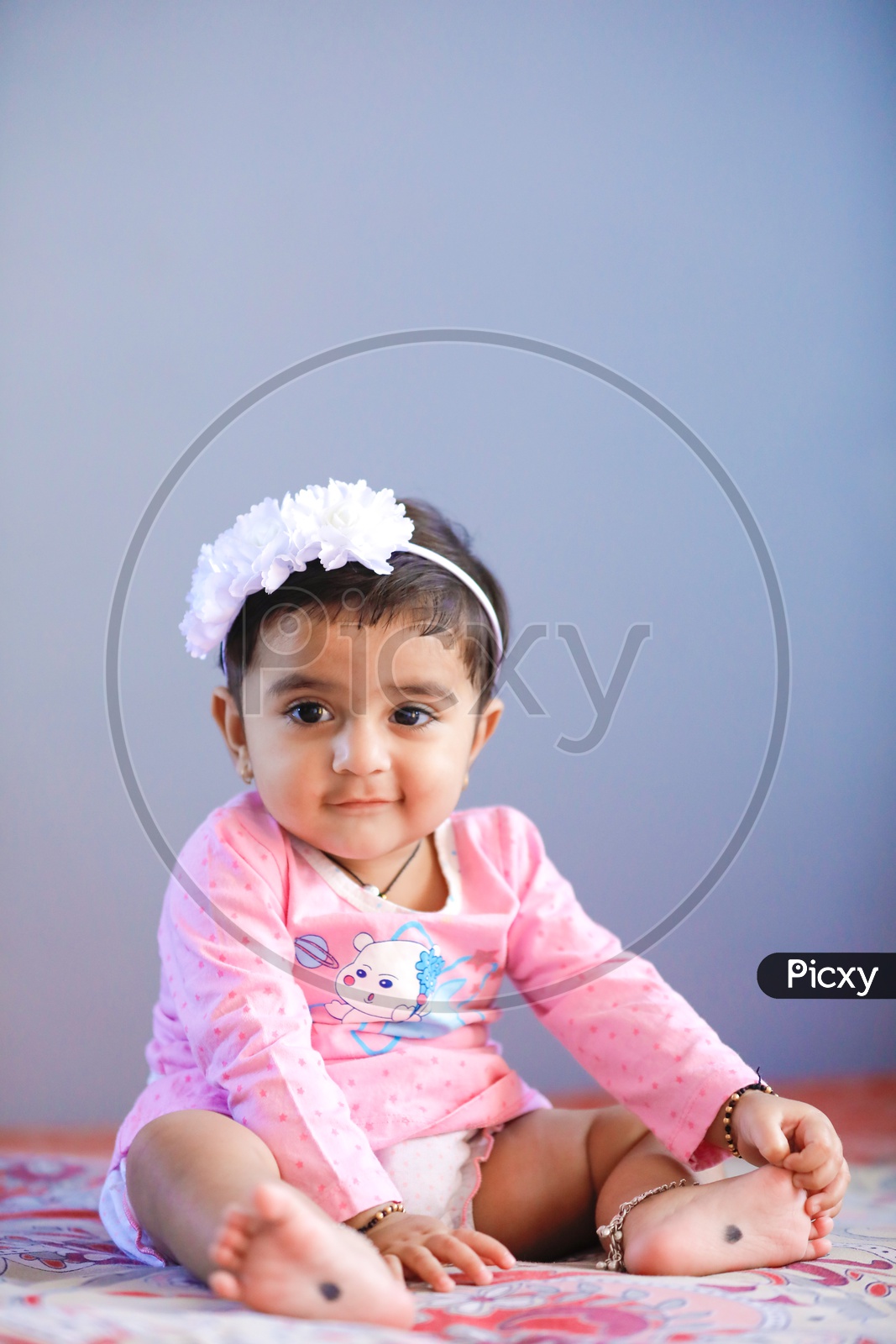 Cute Indian Baby Girl With Cute Expression On Face