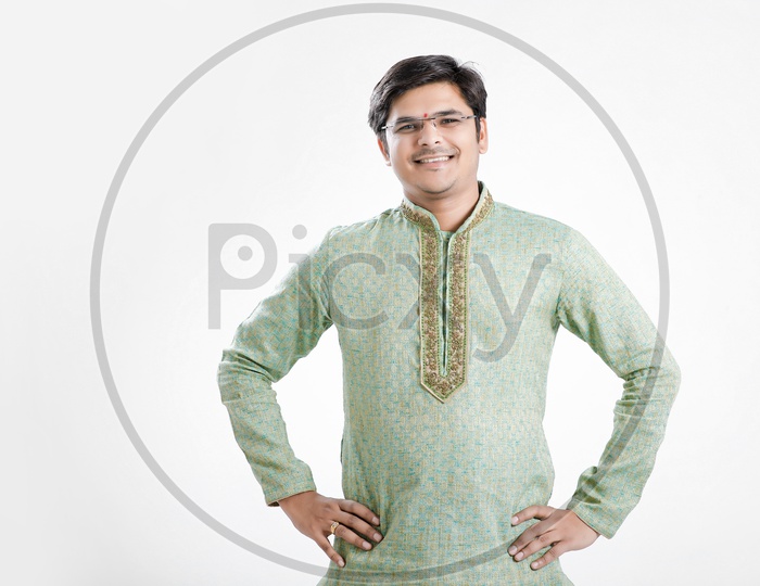 Indian Man Wearing Traditional Dress and With Smile Face On an Isolated White Background