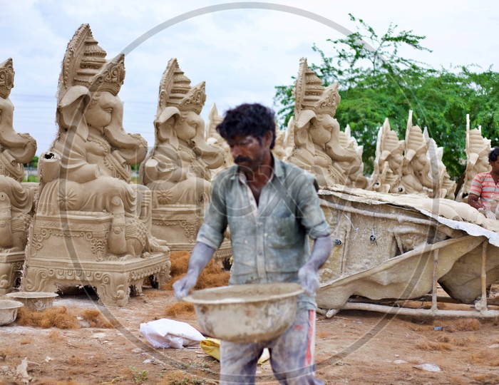 Vinayaka statues being made by plaster of paris.