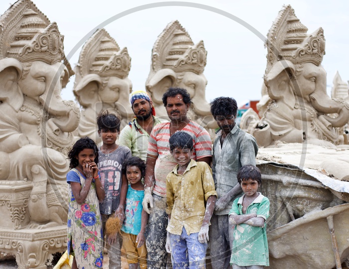 A Ganesh statue making family.