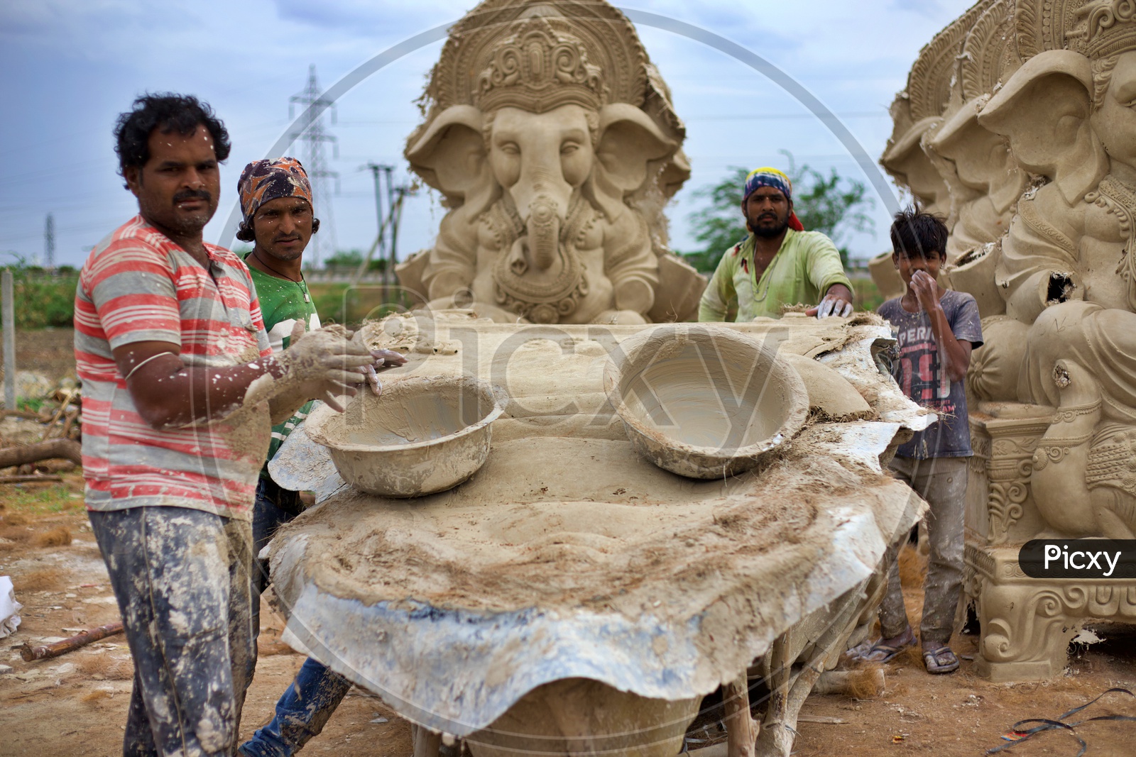 Workers making Vinayaka statues from Plaster of paris.