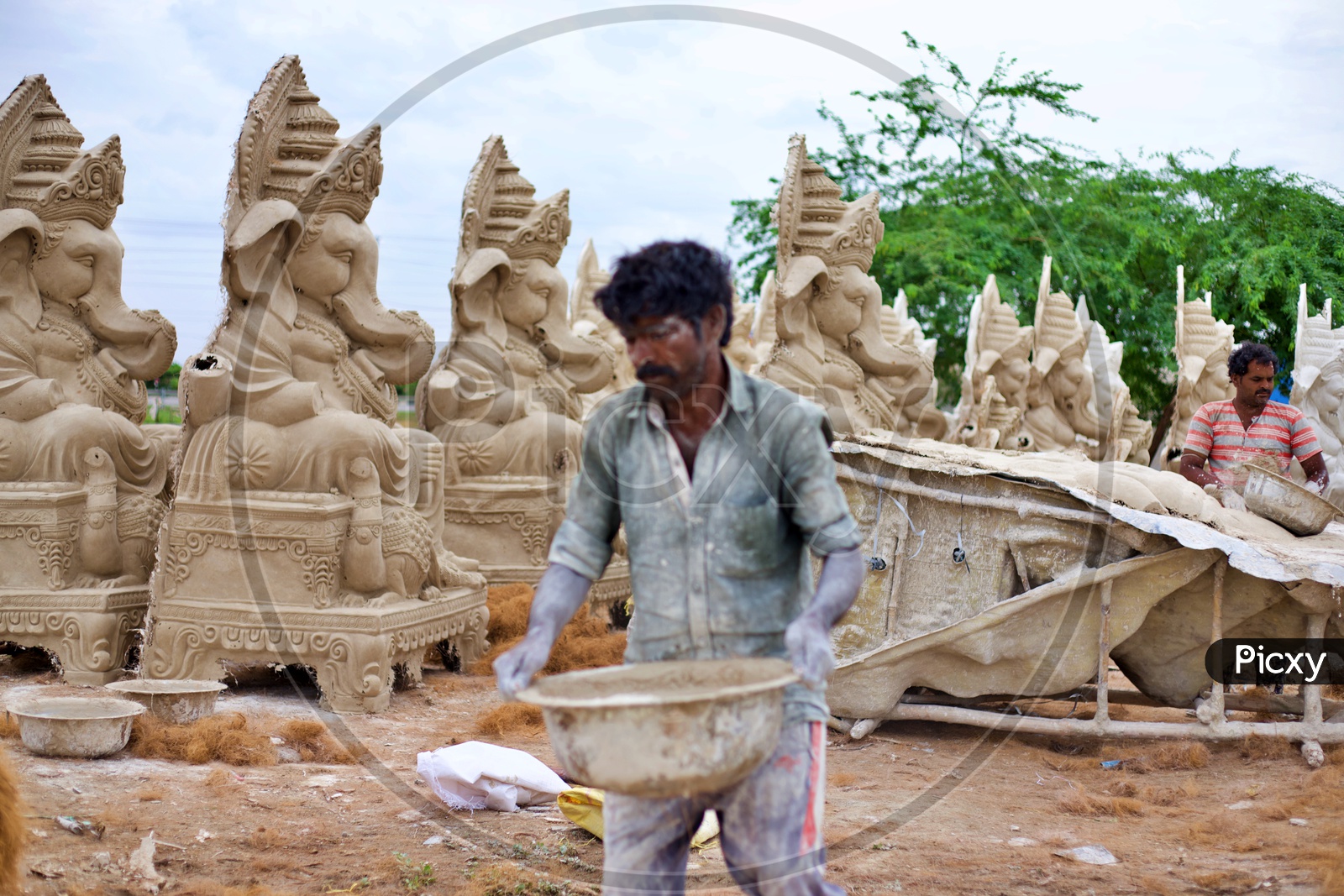 Vinayaka statues being made by plaster of paris.