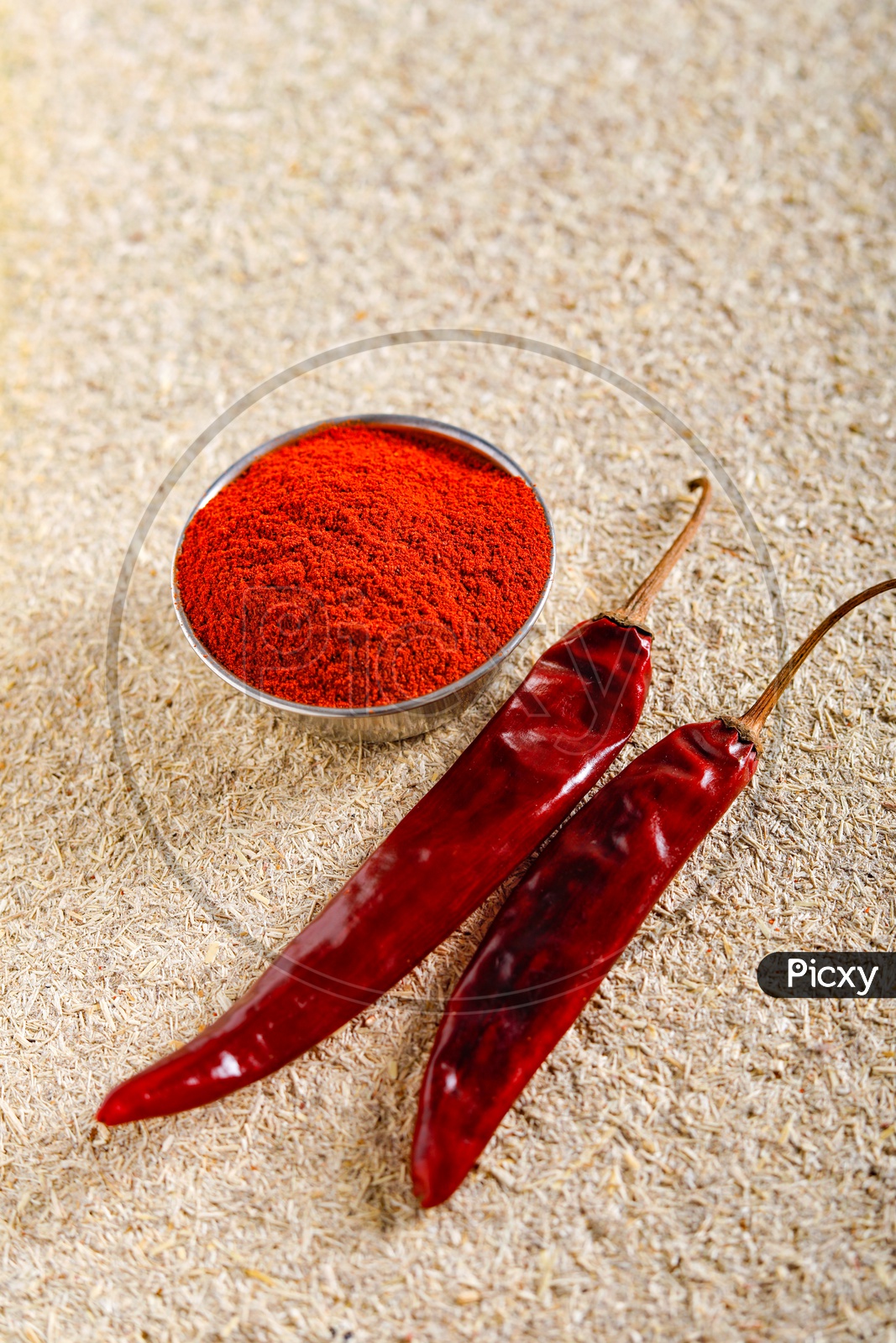 Red Chilli Or Pepper Powder in a Bowl  On an Isolated Background