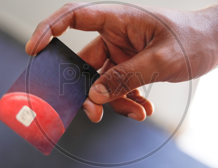 Man Hands Holding Credit Or Debit Card Closeup