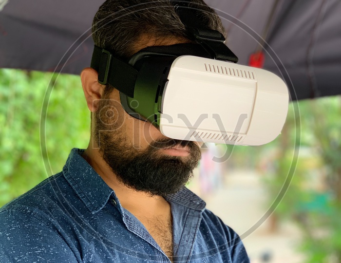 Man using virtual reality box
