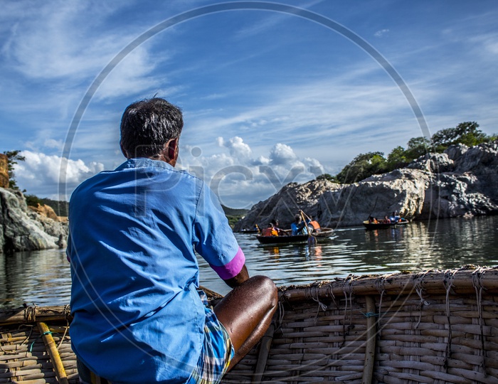 The Driver of the round boat in Hogenakkal  waterfall, Tamilnadu, India