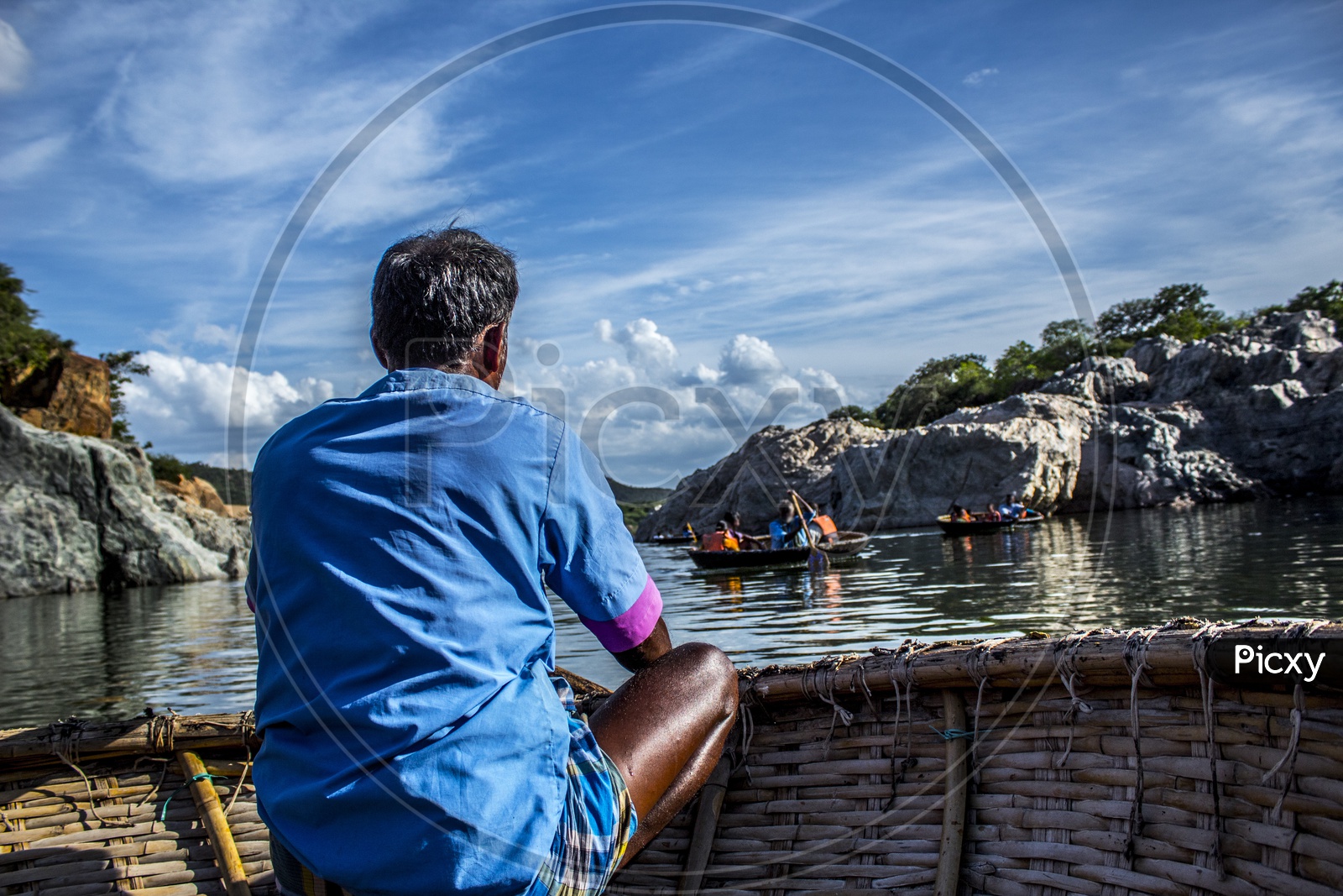 The Driver of the round boat in Hogenakkal  waterfall, Tamilnadu, India