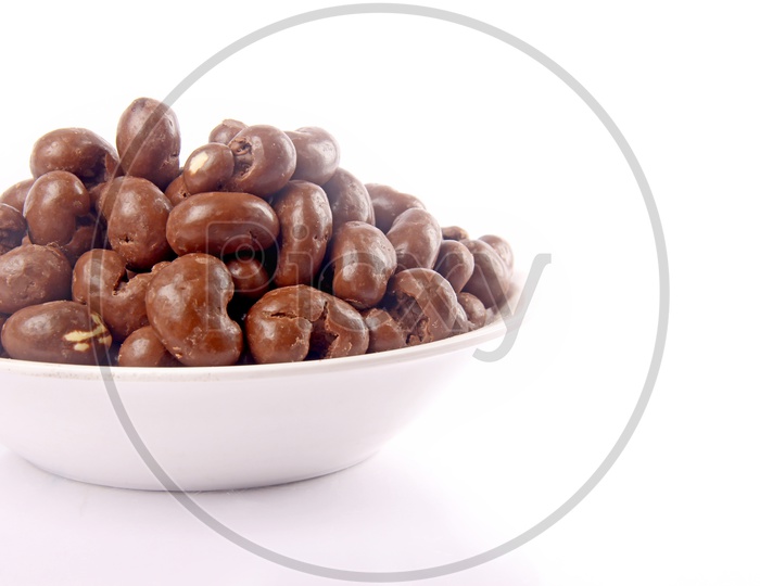 Chocolate Coated Cashew Nuts in a Bowl