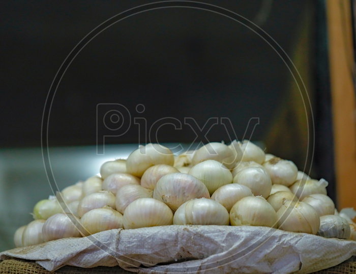 White Onion In a Vegetable Vendor Shop Or Stall