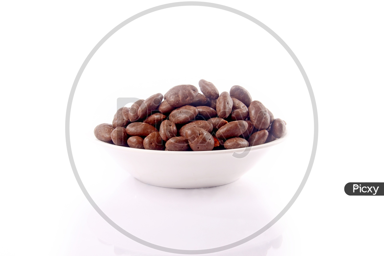 Chocolate Coated Almonds Or Badam Nuts in a Bowl