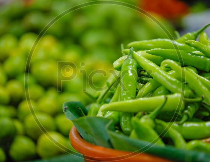 Fresh Green Chillies  In  a Vegetable Vendor Stall or Shop in Market