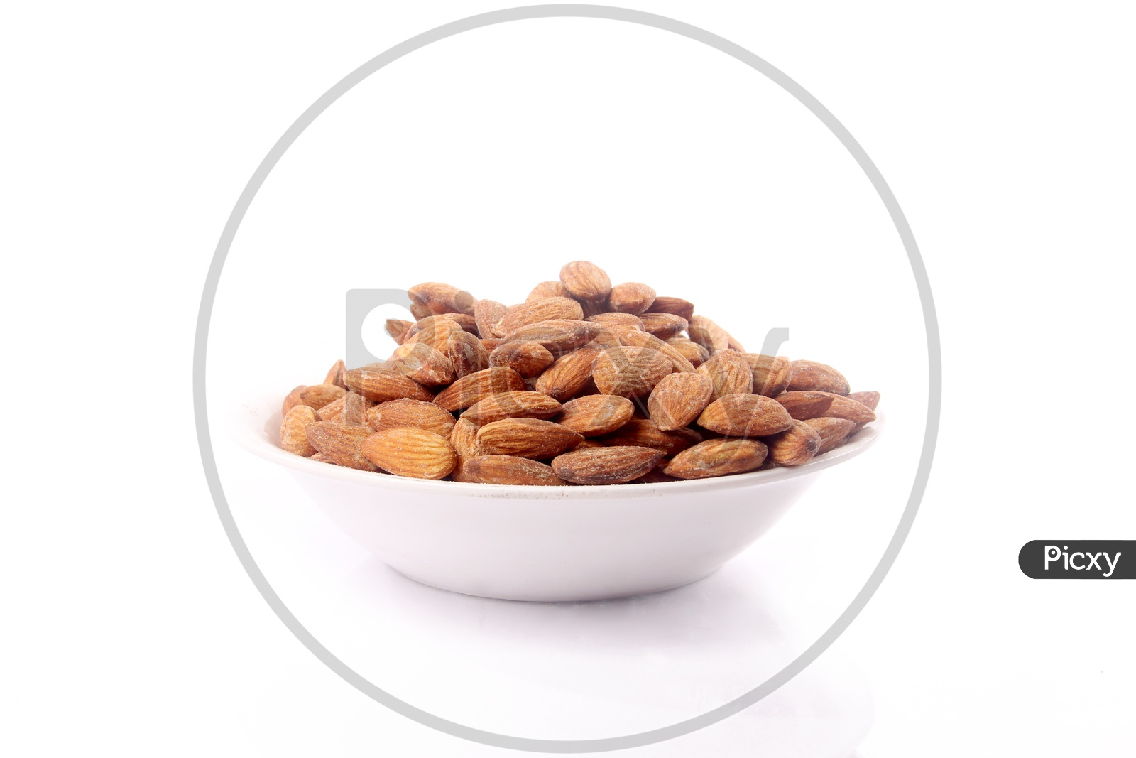 Roasted Almond Or Badam Nuts In a  Bowl On an Isolated White Background