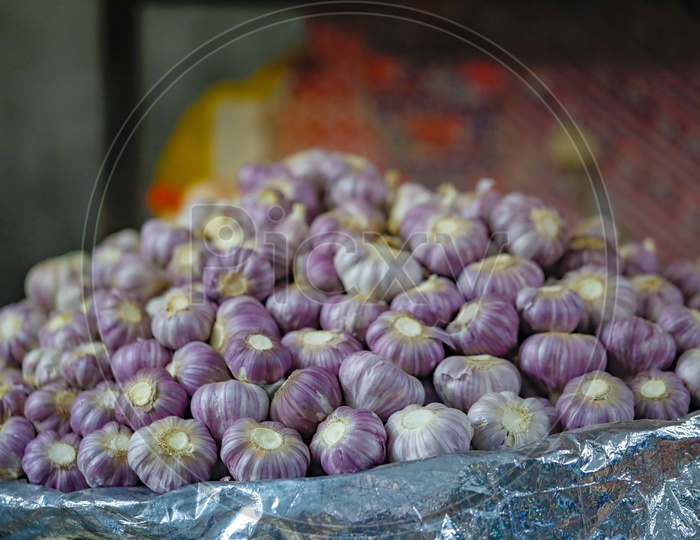 Fresh Garlic  In  a Vegetable Vendor Stall or Shop in Market