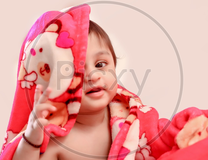 Cute Indian Baby Child Playing in House or Home  Background