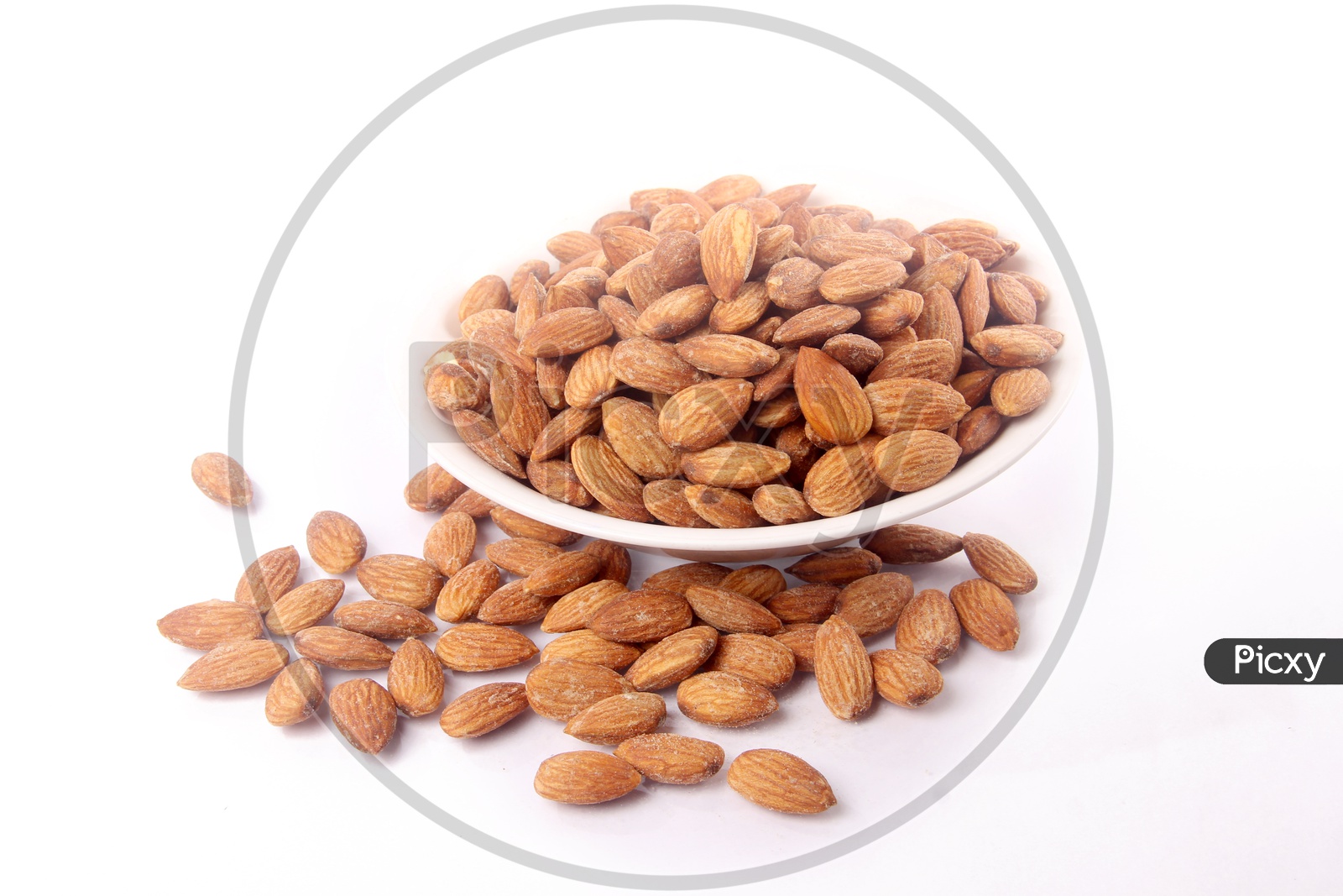 Roasted Almond Or Badam Nuts In a  Bowl On an Isolated White Background