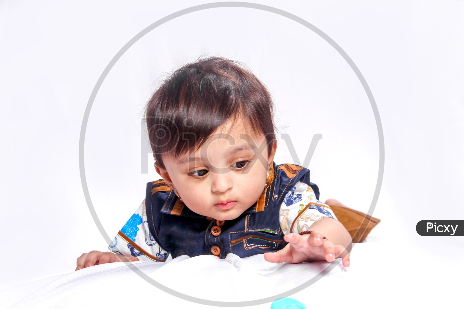 Cute Indian Baby Child Playing in House or Home  Background