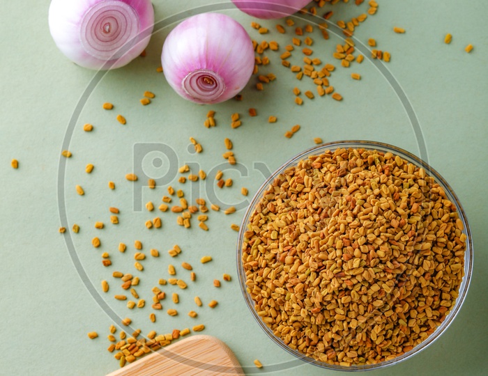 Red Onion Peeled and Spices In a Bowl
