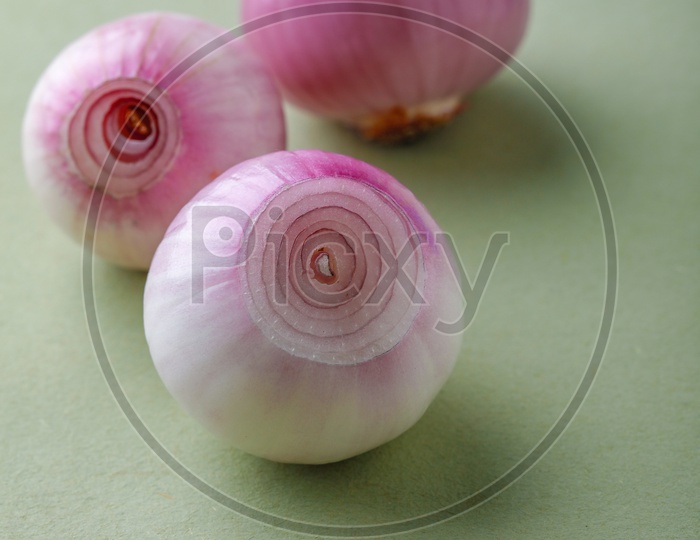 Red Onions Peeled On an  Isolated Background