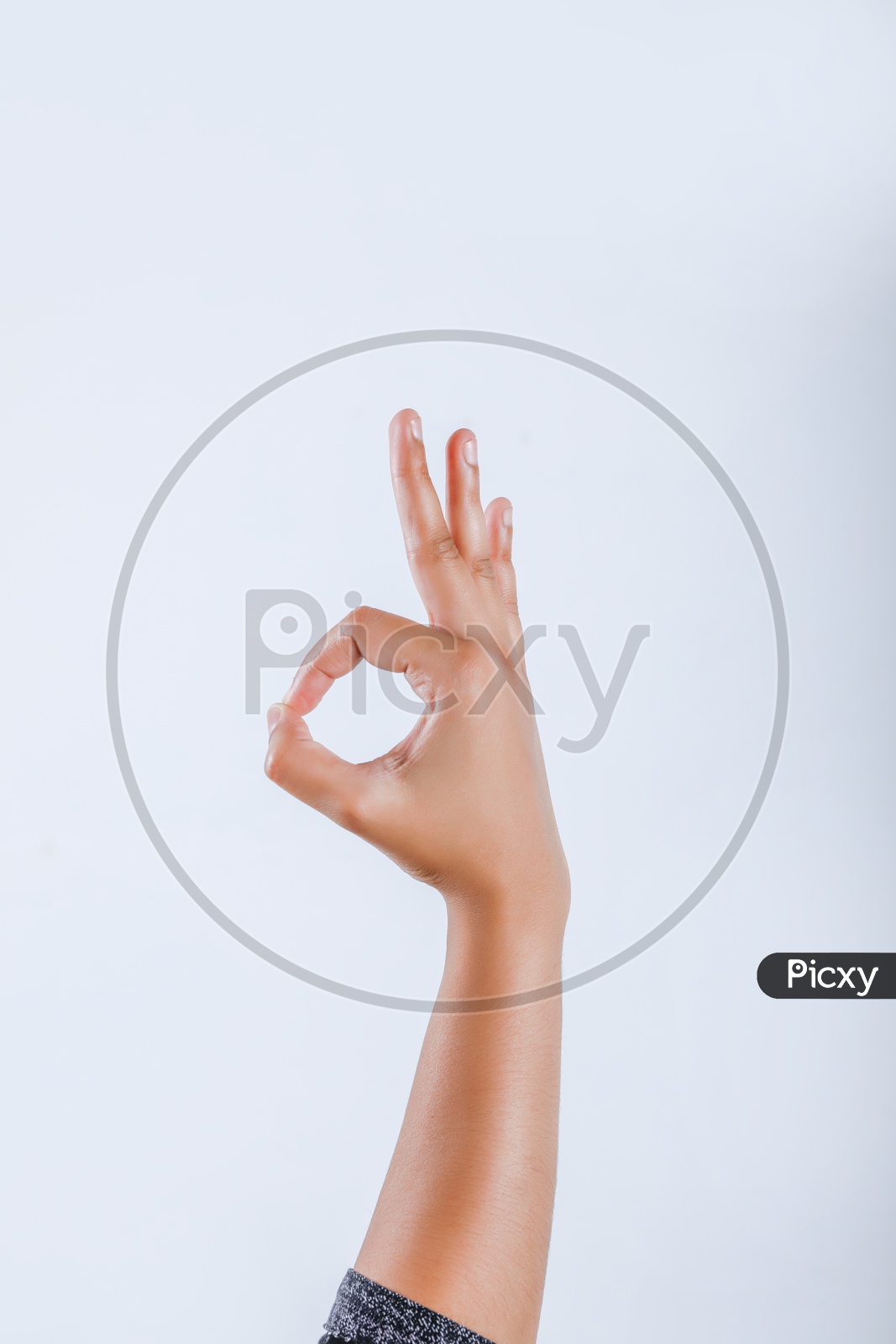 Human Hand Showing OK  or Super Gesture On Isolated Background